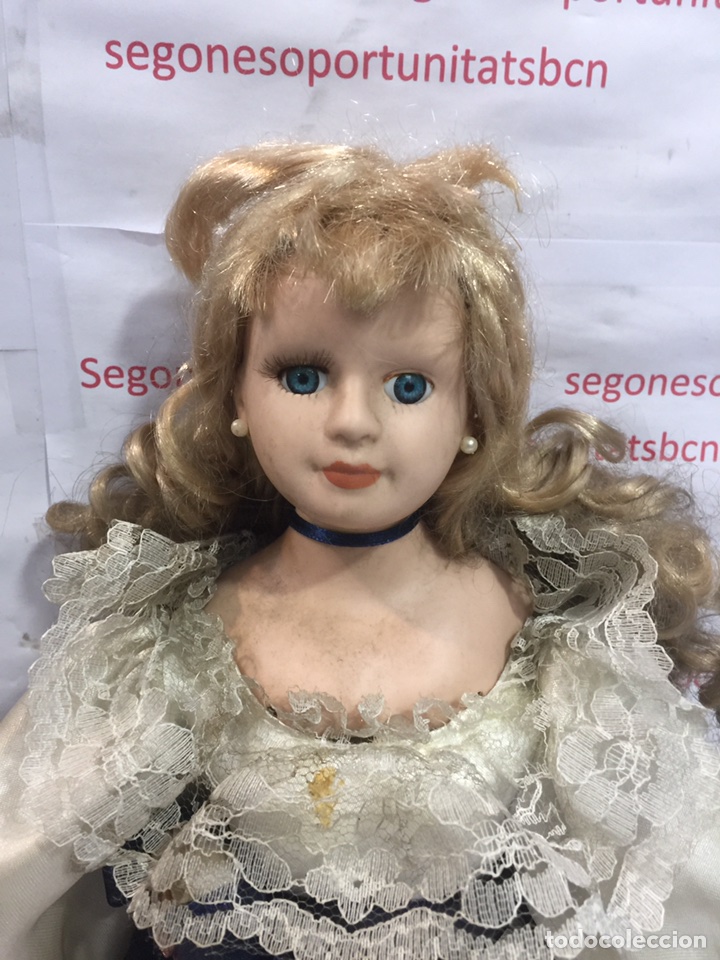 5 MUÑECA DE PORCELANA